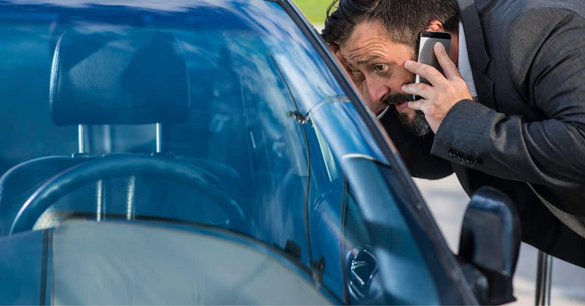 man having car trouble